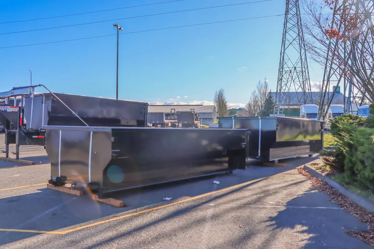 Roll-off dumpster ready for waste disposal at job site for 12 Yard Dumpster Rental in Clifton